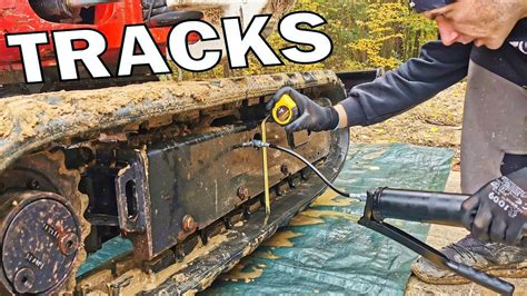 jcb track tension adjustment